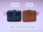 Two leather card holders, one blue and one brown, on a purple background with text indicating dimensions.